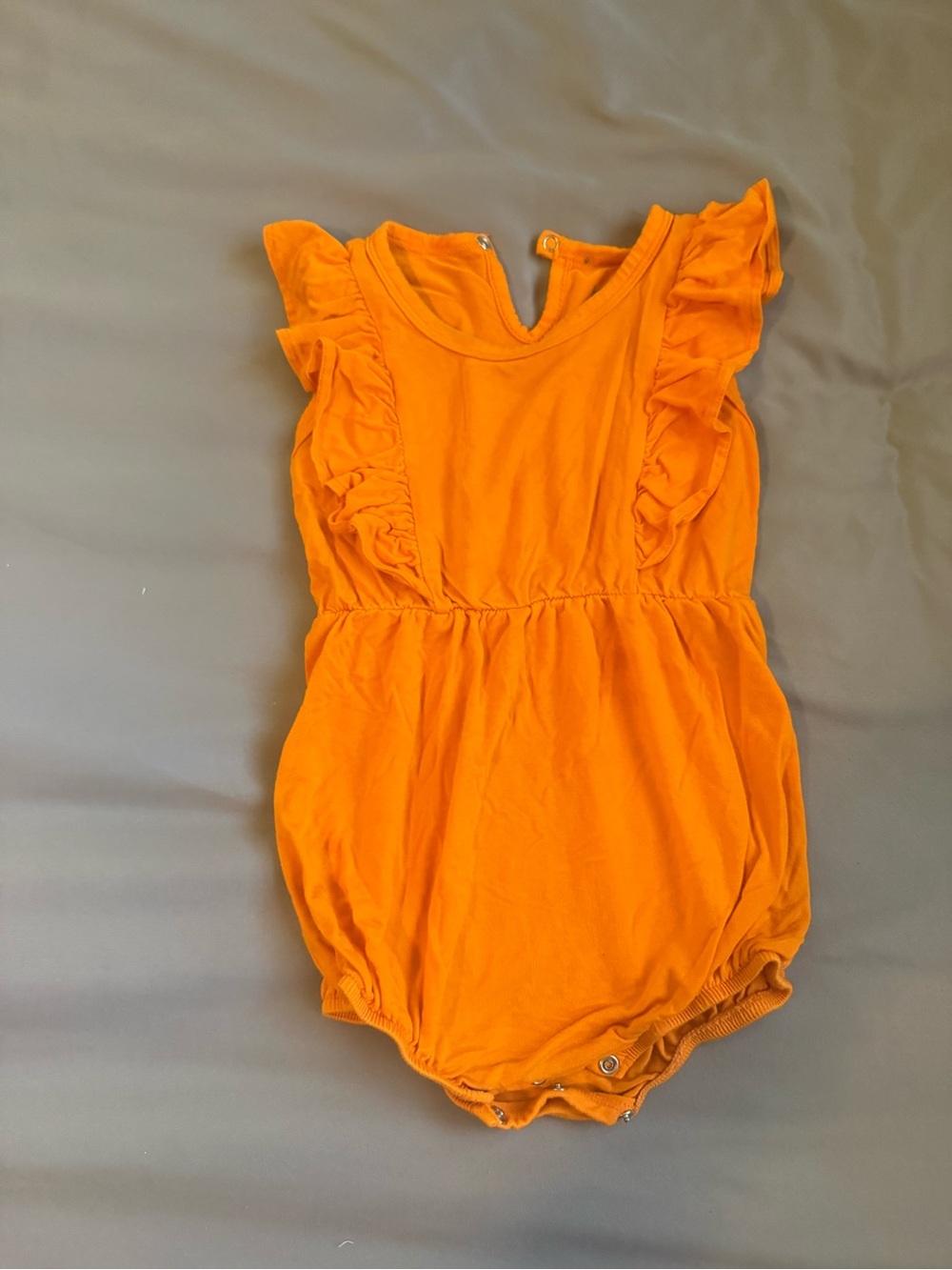 Kyte Baby Ruffle Sleeve Orange Baby Romper